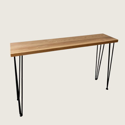 American Oak Modern Hallway Table — angled view showing steel hairpin legs and natural American Oak timber top