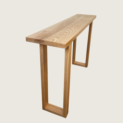 American Oak Classic Hallway Table — angled view showing natural American Oak grain and timber legs