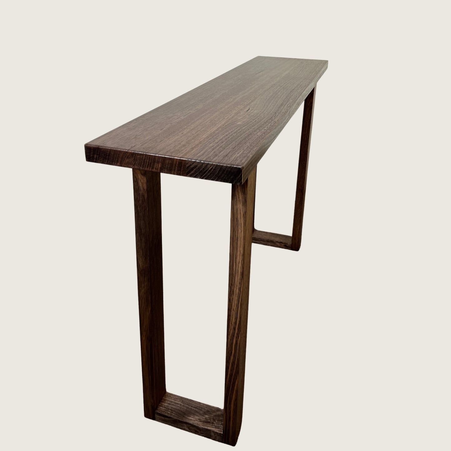 Dark Oak Classic Hallway Table — a dark hardwood console table angled view with a light background