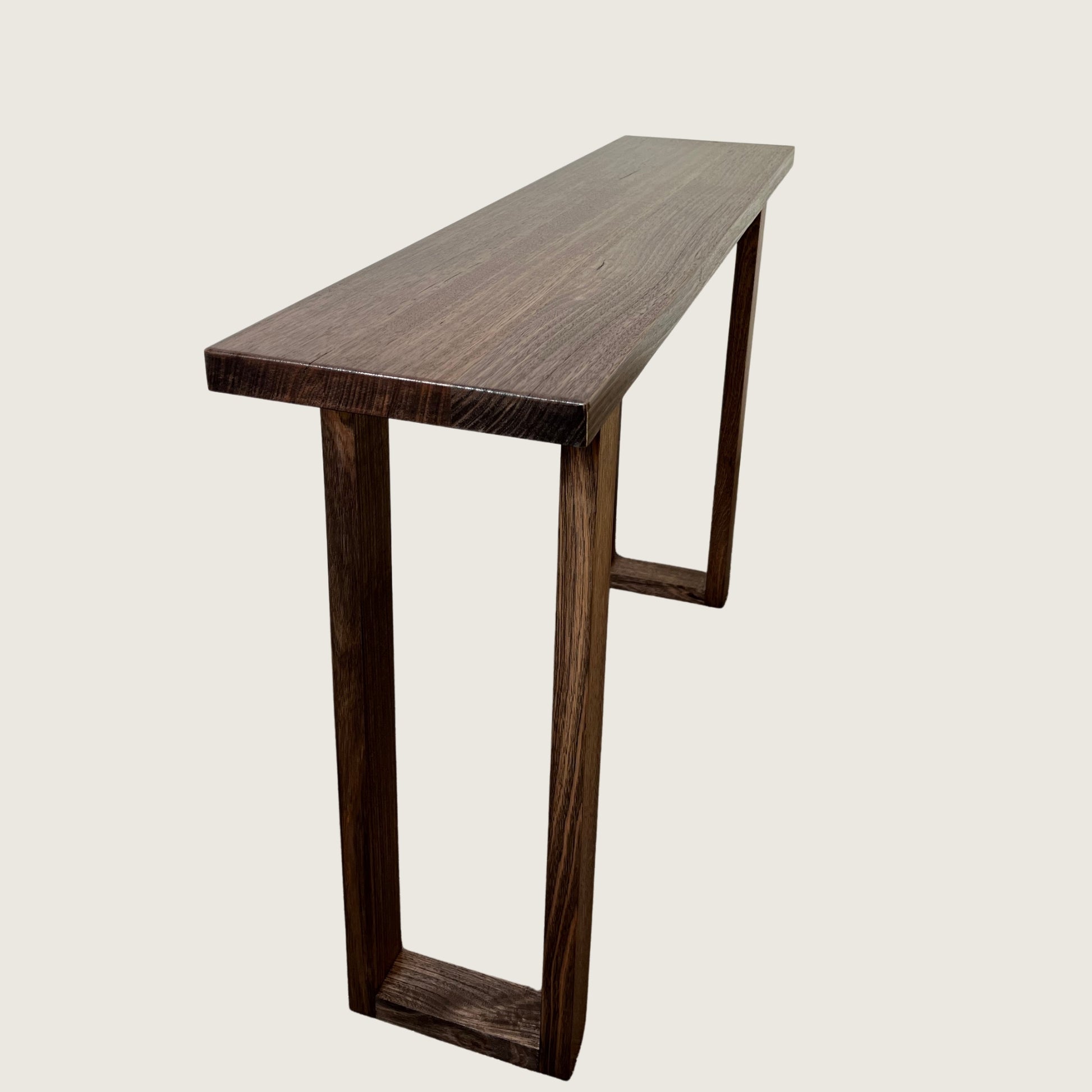 Dark Oak Classic Hallway Table — a dark hardwood console table angled view with a light background