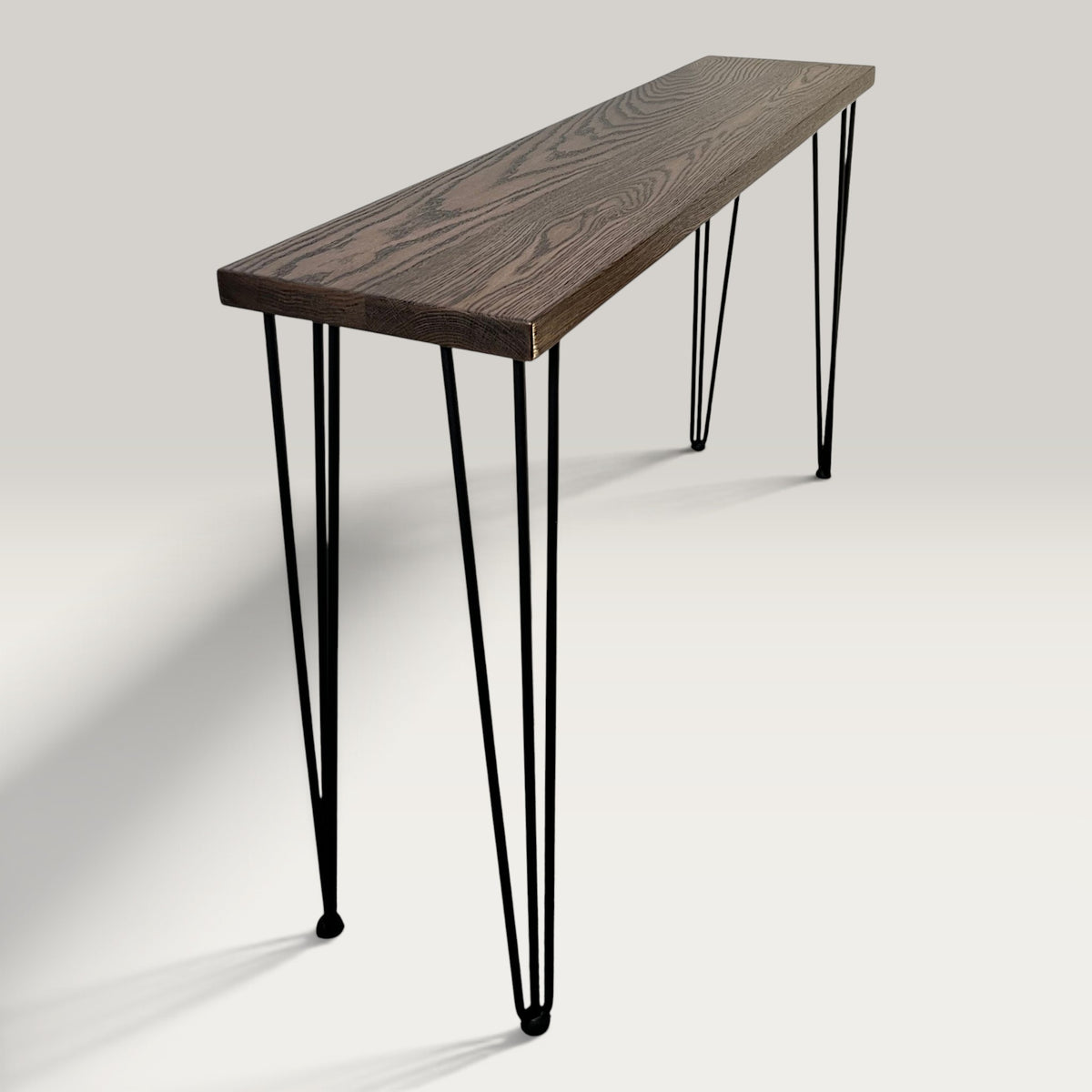 Walnut Modern Hallway Table — solid American Oak hardwood console table with steel hairpin legs in walnut stain finish, side view