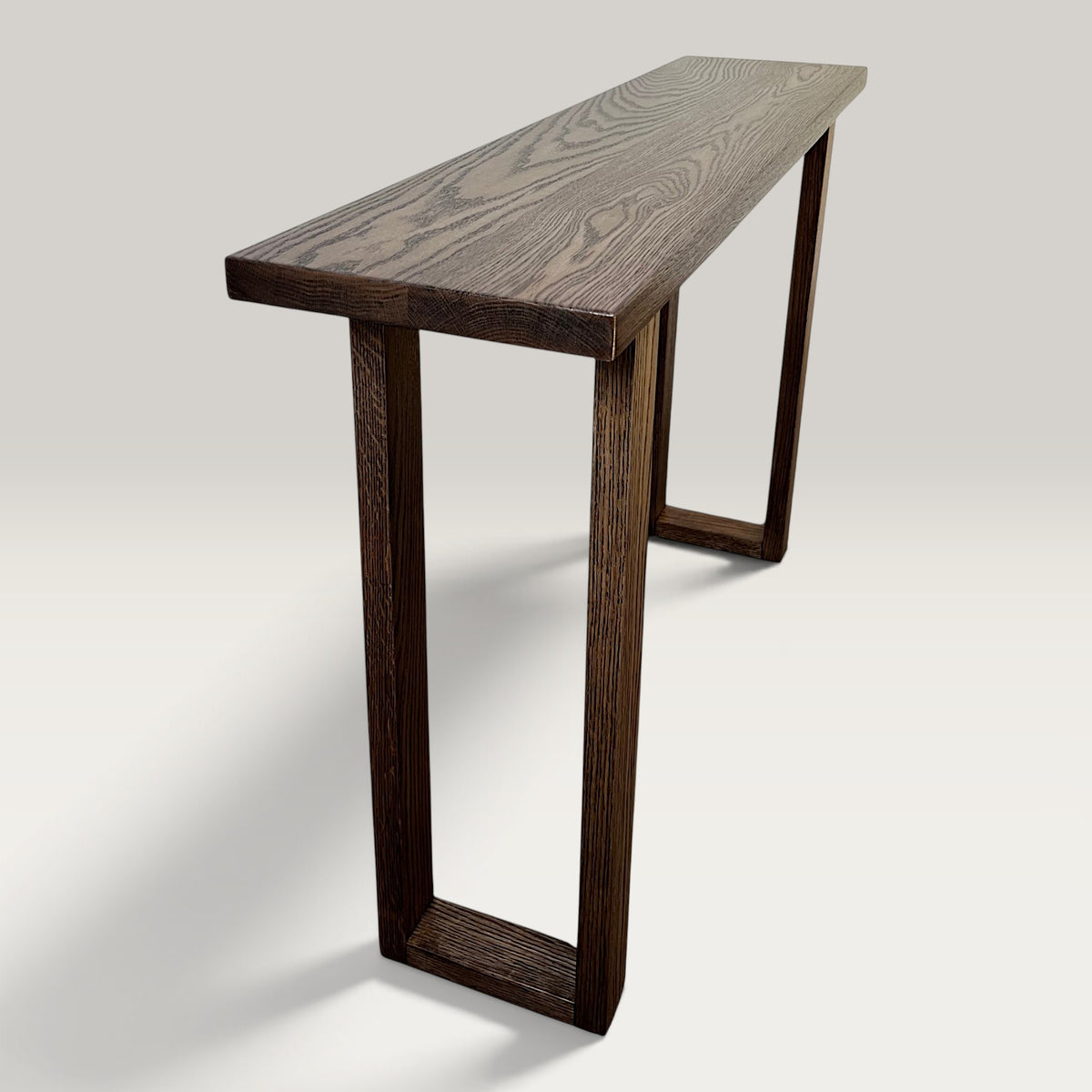 Walnut Classic Hallway Table — solid American Oak hardwood console table with U-shaped timber legs in walnut stain finish, close angled view