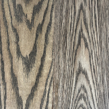 Close-up of American Oak hardwood in dark walnut stain, showing the grain and finish