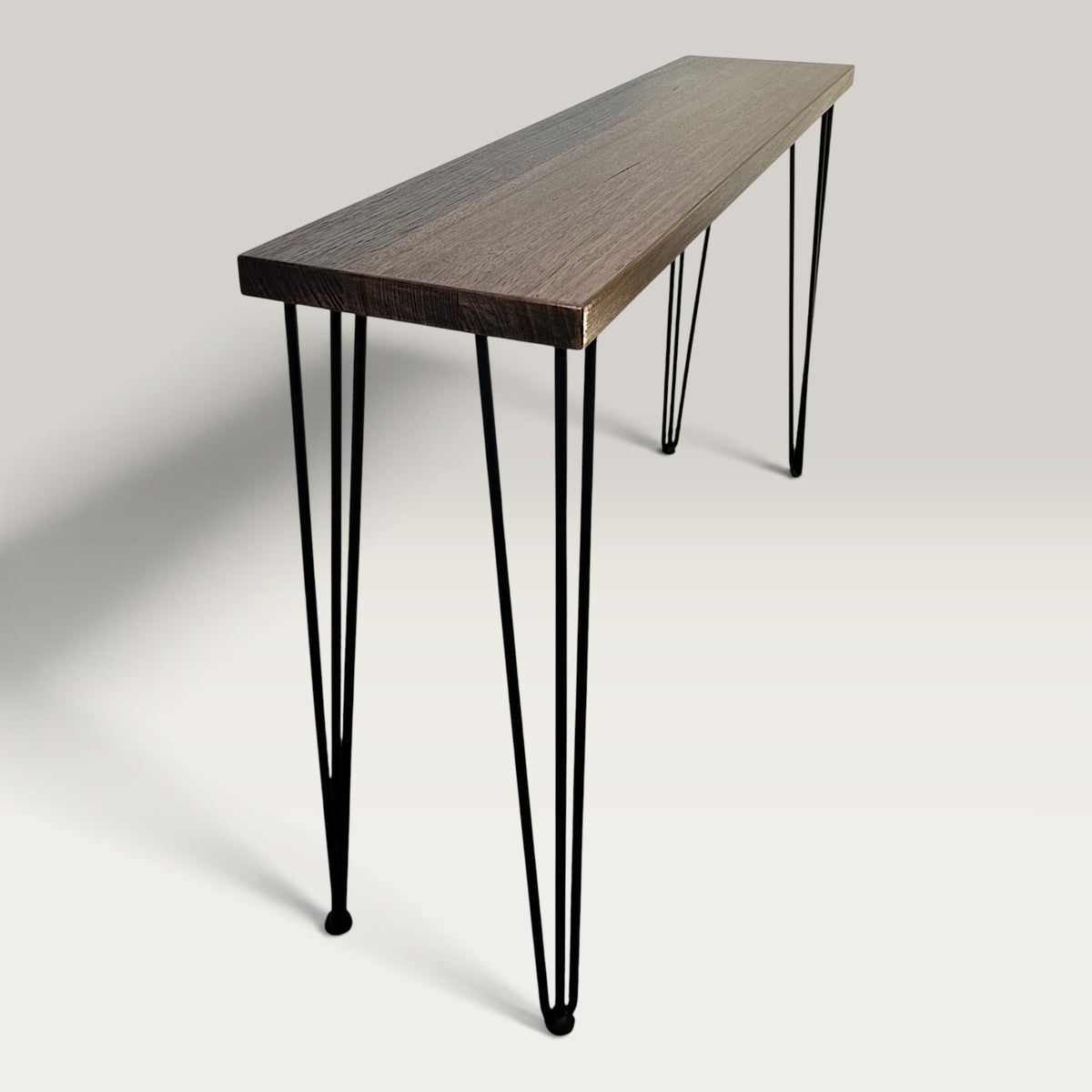 Dark Oak Modern Hallway Table — solid Australian hardwood console table with steel hairpin legs, angled view