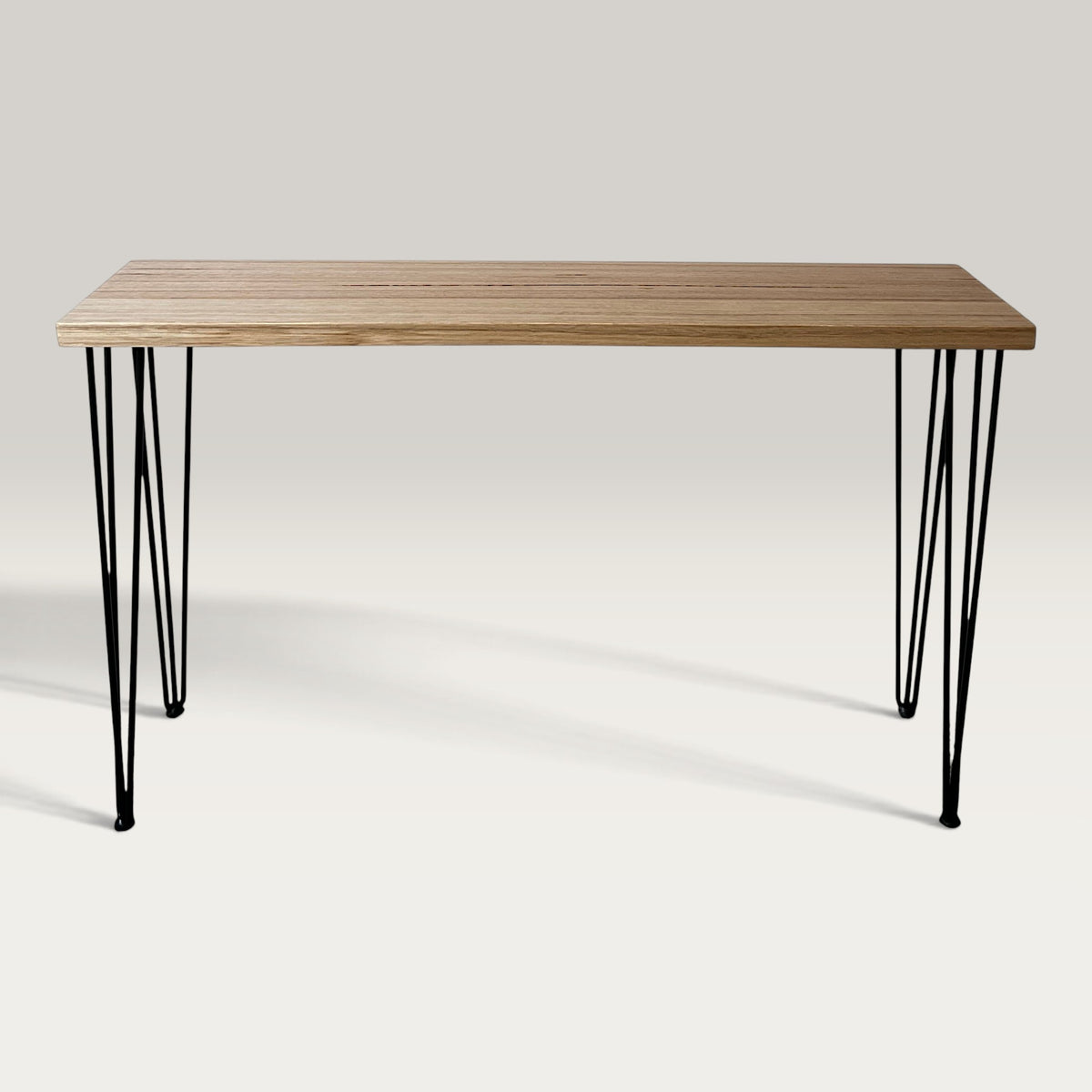 Tasmanian Oak Modern Hallway Table — angled view showing steel hairpin legs and natural Tasmanian Oak timber 