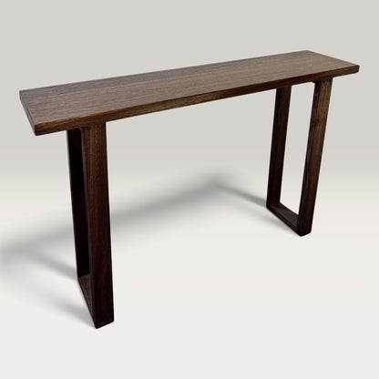 Dark Oak Classic Hallway Table — a dark hardwood console table with U-shaped legs on a light background